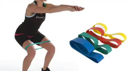 girl working out with resistance band image